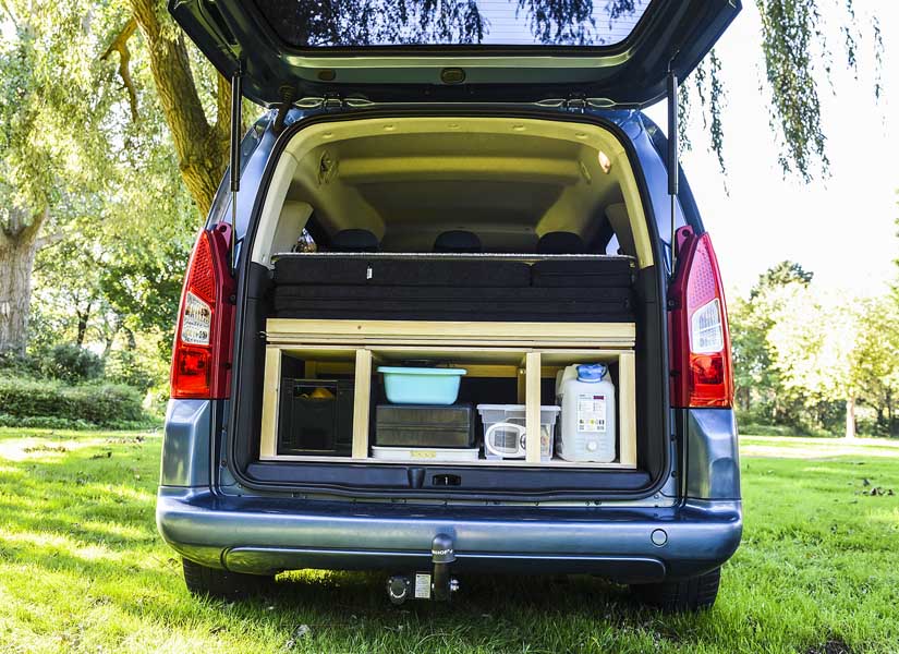 When not in use, the camper van conversion module folds into the boot of your Citroen Berlingo, allowing you to use the rear seats as normal.