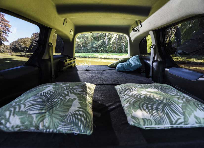 Our Fiat Doblo camper van conversion module unfolds in seconds to create a completely flat sleeping platform with space for 2 adults.