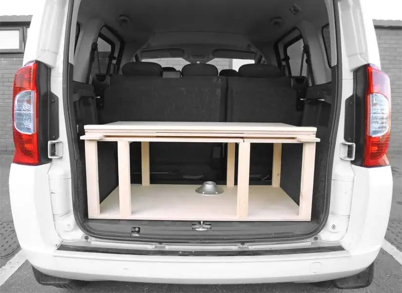 When not in use, the camper van conversion module folds into the boot of your car, allowing you to use the rear seats as normal.