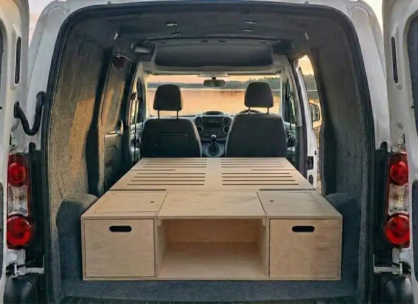 The machined bed slots decrease the weight of the VAN MAX camper van conversion module and increase mattress ventilation. The machined bed slots decrease the weight of the VAN MAX camper van conversion module and increase mattress ventilation.