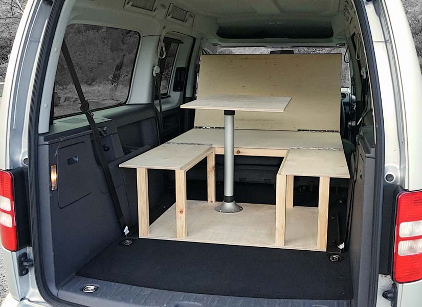 The VW Caddy Maxi Life camper van conversion in seating mode.